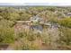 Aerial view of a house surrounded by trees and other houses in the neighborhood at 1063 Eagles Forrest, Apopka, FL 32712