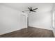 A bedroom with hardwood flooring, ceiling fan, and closet at 1063 Eagles Forrest, Apopka, FL 32712