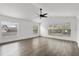 Large bedroom with high vaulted ceilings, ceiling fan, and plenty of windows at 1063 Eagles Forrest, Apopka, FL 32712