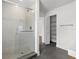 Neutral laundry room featuring black tile floor and a window for natural light at 1063 Eagles Forrest, Apopka, FL 32712