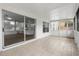 Bright, screened porch featuring tile flooring, and view to the inside and backyard at 1063 Eagles Forrest, Apopka, FL 32712