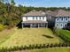 Aerial view of a home with a large backyard and covered patio at 11206 Pixie Mandarin Ct, Winter Garden, FL 34787