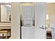 The laundry area with stackable washer and dryer units at 12521 Floridays Resort Dr # 307F, Orlando, FL 32821