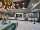 Grand hotel lobby featuring stylish seating, chandelier, and a reception area, creating a welcoming ambiance at 12521 Floridays Resort Dr # 307F, Orlando, FL 32821