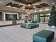 Expansive lobby featuring elegant decor, comfortable seating, and a festive Christmas tree at 12521 Floridays Resort Dr # 307F, Orlando, FL 32821