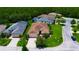 Aerial view of a well maintained home with manicured lawn and green landscaping at 1368 Del Mar Dr, Kissimmee, FL 34759