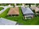 Charming residence with a well-manicured lawn and a screened-in pool, perfect for outdoor gatherings and relaxation at 1368 Del Mar Dr, Kissimmee, FL 34759