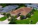 Beautiful single-story home with a brick driveway, well-manicured lawn, and mature landscaping at 1368 Del Mar Dr, Kissimmee, FL 34759