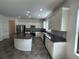 Modern kitchen with stainless appliances, granite counters and ample cabinetry at 1368 Del Mar Dr, Kissimmee, FL 34759