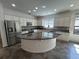 Kitchen with white cabinets, granite countertops, and stainless steel appliances at 1368 Del Mar Dr, Kissimmee, FL 34759