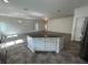 Stylish kitchen island with granite countertop in an open-concept floor plan at 1368 Del Mar Dr, Kissimmee, FL 34759