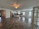 Bright and airy living room featuring a large, open space with tile flooring at 1368 Del Mar Dr, Kissimmee, FL 34759