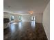 Inviting living room with tile flooring, open layout, and access to the kitchen at 1368 Del Mar Dr, Kissimmee, FL 34759