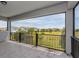 Overhead balcony view with railing showing neighborhood homes and landscaping at 15724 Cutter Sail Pl, Winter Garden, FL 34787
