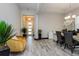 The foyer is spacious with decorative plants and stylish furniture at 15724 Cutter Sail Pl, Winter Garden, FL 34787