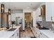 The kitchen includes stainless steel appliances and a modern range hood at 15724 Cutter Sail Pl, Winter Garden, FL 34787
