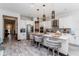 A spacious kitchen features an island with seating and pendant lighting at 15724 Cutter Sail Pl, Winter Garden, FL 34787