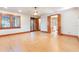 Bright bedroom with ensuite bathroom featuring wood trim and a ceiling fan at 1612 E Washington St, Orlando, FL 32803
