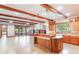 Spacious kitchen with custom cabinetry, an island, and exposed wooden beams at 1612 E Washington St, Orlando, FL 32803