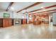 Spacious living area boasts a cozy fireplace and natural light from large windows at 1612 E Washington St, Orlando, FL 32803
