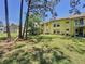 Enjoy this condo's backyard with well-maintained landscaping and lush grass, perfect for relaxing outdoors at 2040 Royal Bay Blvd # 30, Kissimmee, FL 34746