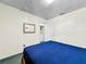 Bedroom featuring closet, neutral walls, and access to a utility area with laundry equipment at 2040 Royal Bay Blvd # 30, Kissimmee, FL 34746