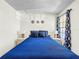 Bedroom showcasing a comfortable bed, soft lighting, and patterned curtains at 2040 Royal Bay Blvd # 30, Kissimmee, FL 34746