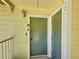 Apartment door with secure entry and modern lighting, ensuring safety and convenience at 2040 Royal Bay Blvd # 30, Kissimmee, FL 34746