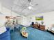 Open-concept living and dining area with vaulted ceilings, lots of light, and ceiling fan at 2040 Royal Bay Blvd # 30, Kissimmee, FL 34746