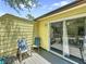 Cozy deck with chairs and green scenery for enjoying outdoor relaxation at 2040 Royal Bay Blvd # 30, Kissimmee, FL 34746