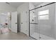 Contemporary bathroom featuring glass-enclosed shower and modern fixtures at 2415 Sw 165Th Pl, Ocala, FL 34473