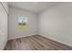 Bright bedroom featuring hard wood floors, a window for natural light and closet at 2415 Sw 165Th Pl, Ocala, FL 34473