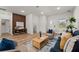 Spacious living room with hardwood floors, decorative accents, and plenty of natural light at 2415 Sw 165Th Pl, Ocala, FL 34473