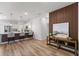 Modern kitchen and living space with wood accents and decor at 2415 Sw 165Th Pl, Ocala, FL 34473