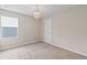 Bedroom featuring neutral walls, carpet flooring, and a decorative chandelier at 2546 Empress Dr, Kissimmee, FL 34741