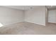 Neutral bedroom with carpet flooring and a door at 2546 Empress Dr, Kissimmee, FL 34741