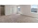 Bedroom features a large window, and an en-suite bathroom at 2546 Empress Dr, Kissimmee, FL 34741