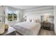 Bright bedroom featuring a large window, plush carpeting and neutral color palette at 2610 Grandbury Grove Rd, Lakeland, FL 33811