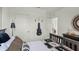 This unique bedroom is fitted with guitar décor and a decorative mirror for style and sophistication at 2610 Grandbury Grove Rd, Lakeland, FL 33811
