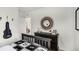 Unique guitar decor, including a decorative mirror, makes this bedroom complete and ready to enjoy at 2610 Grandbury Grove Rd, Lakeland, FL 33811