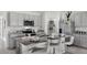 Well-equipped kitchen with stainless steel appliances, granite countertops, and barstool seating at 2610 Grandbury Grove Rd, Lakeland, FL 33811