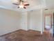 Bedroom with a ceiling fan, recessed lighting, and carpet flooring at 27307 Pine Straw Rd, Leesburg, FL 34748