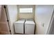 Laundry room with washer and dryer appliances at 27307 Pine Straw Rd, Leesburg, FL 34748