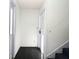 Clean entryway with tile flooring leading to the interior with stairs at 3057 Aaron Burr Ave # 1, Winter Park, FL 32792