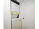 Convenient in-unit laundry closet with stacked washer and dryer at 3057 Aaron Burr Ave # 1, Winter Park, FL 32792