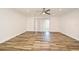 Bright and airy living room with modern wood-style tile flooring and sliding glass doors at 3057 Aaron Burr Ave # 1, Winter Park, FL 32792