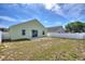Picture of a backyard featuring a patio, lawn, and privacy fence at 326 Cotswold Cir, Davenport, FL 33837