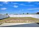 A vast backyard with lawn, concrete patio, and privacy fence at 326 Cotswold Cir, Davenport, FL 33837