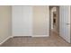 Bedroom featuring tiled floor and a view to the rest of the house at 326 Cotswold Cir, Davenport, FL 33837