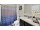 Bathroom with a shower/tub combo and stylish granite countertops at 3308 Country Walk Club Cir, Winter Haven, FL 33881